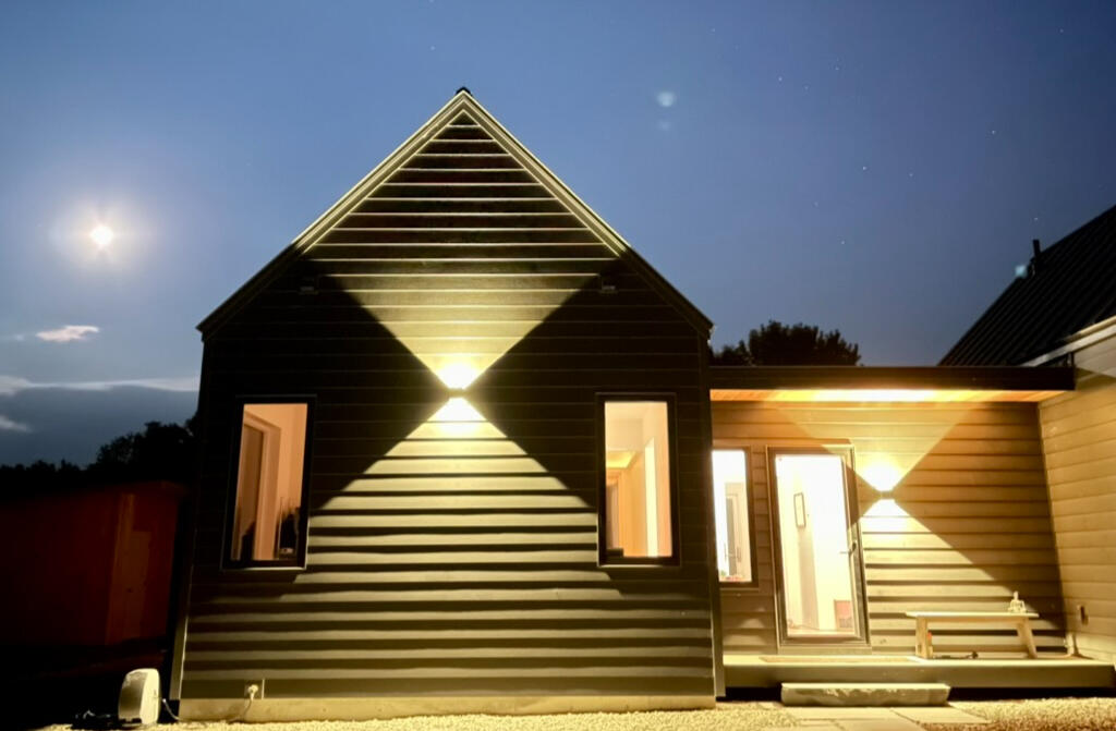 Exterior LEDs with moveable internal vanes to direct the light as desired.